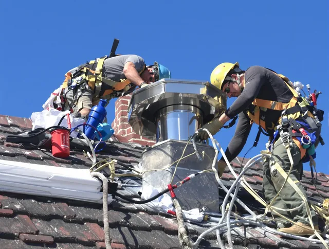 Protective chimney cap installed by Cleveland Heights Chimney Sweep in Cleveland Heights, OH